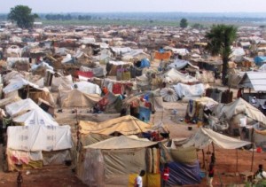 A picture taken on March 18, 2014 in Bangui shows a  makeshift camp near Bangui's airport where some 100,000 people who had fled their homes are crammed into a vast tent city near the bases of foreign soldiers. AFP PHOTO PACOME        (Photo credit should read PACOME PABAMDJI/AFP/Getty Images)